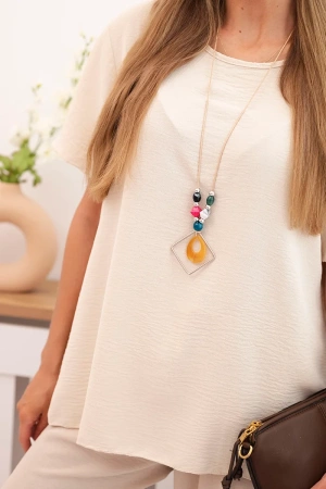 Komplet damska z luźną bluzką i szerokimi spodniami beżowy