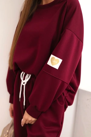 Komplet damski masełkowy z luźną bluzą i spodniami z napisem LOVE śliwkowy