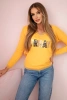 Bluza damska z napisem z cekinami musztardowa