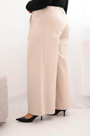 Spodnie damskie Plus Size z szerokimi nogawkami i plisowaniem beżowe