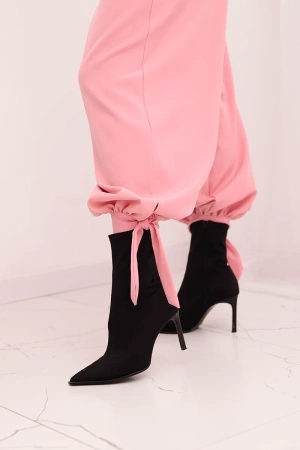 Spodnie damskie z szeroką nogawką i wiązaniem u dołu jasno różowe