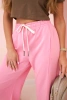 Spodnie masełko wiązane w pasie różowe