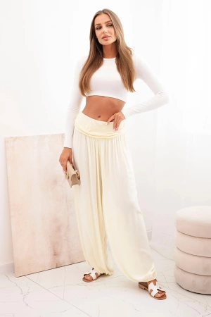 Spodnie damskie wiskozowe z szeroką nogawką i marszczeniami żółte