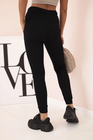 Spodnie dresowe damskie z kieszeniami i wiązaniem w pasie czarne