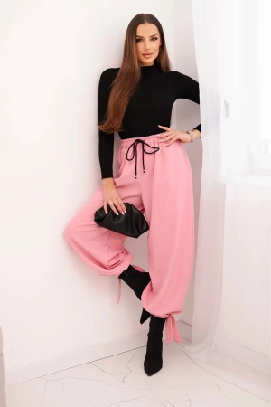 Spodnie damskie z szeroką nogawką i wiązaniem u dołu jasno różowe