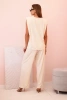 Komplet damski z wiskozy bez rękawów i prostymi spodniami jasny beżowy