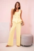 Kombinezon damski bez rękawów z szeroką nogawką i ozdobnymi guzikami żółta