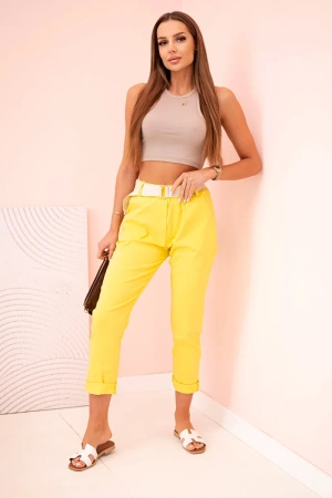 Spodnie damskie z wiskozy z paskiem i podwiniętą nogawką ciemne żółte