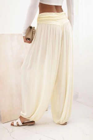Spodnie damskie wiskozowe z szeroką nogawką i marszczeniami żółte