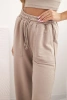 Spodnie damskie bawełniane z szeroką nogawką i kieszeniami beżowe