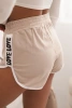 Szorty damskie bawełniane z elastycznym pasem i sportową lamówką beżowe
