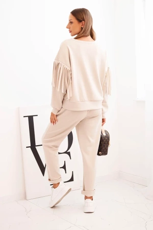 Komplet damski masełkowy z frędzlami na rękawach beżowy