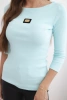 Bluzka damska prążkowana z rękawem 3/4 i ozdobną naszywką miętowa