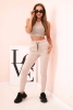 Spodnie dresowe damskie z kieszeniami i wiązaniem w pasie beżowe